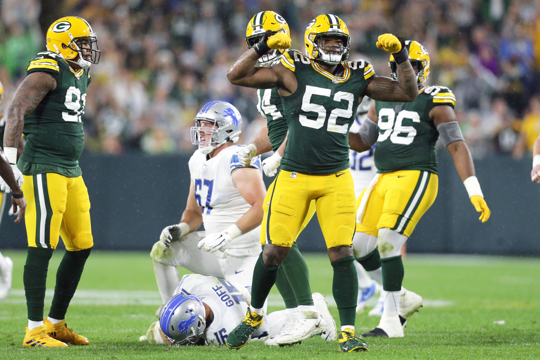 Rashan Gary celebrates against Lions, State Journal photo